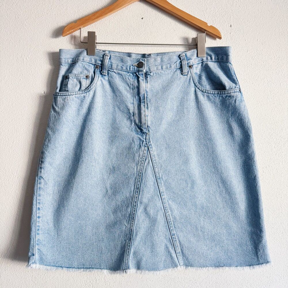 90s vintage light wash high waist denim mini skirt w/ frayed hem